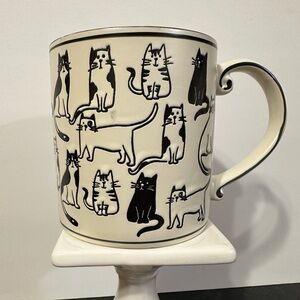 All over cat design mug